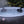 Load image into Gallery viewer, Inflatable hot tub with water features in a garden setting

